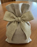Beige saco de linho com laço em fita lumina lurex 55mm apresentando trama texturada e brilho subtil