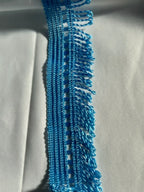 Franja salon l&l em seda técnica azul brilhante com 50mm e design torcido e texturizado